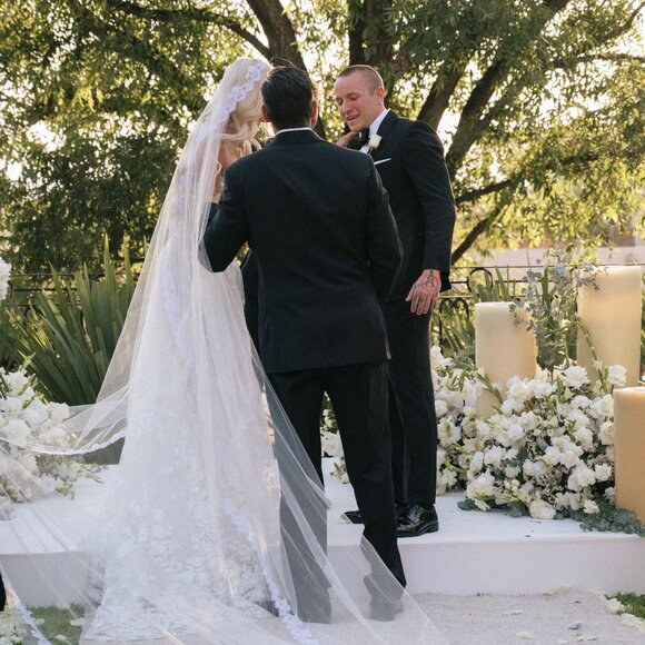 New Mantilla style custom Kleinfeld veil in Diamond White Tulle/White Lace. main image 9
